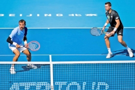 Ivan Dodig i Austin Krajicek u Pekingu ušli u sedmo finale ove sezone