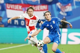 Luka Modrić i Riccardo Calafiori